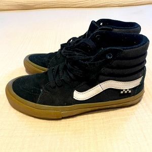 Black Vans with gum sole. Men’s size 6.